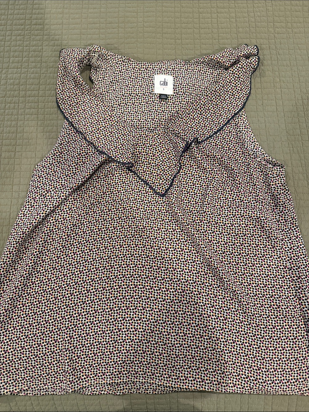 CAbi Sleeveless Ruffle Neck Tank in Cream and Navy Dot Print